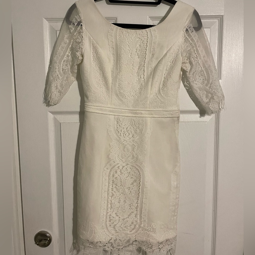 White/ cream open back white dress